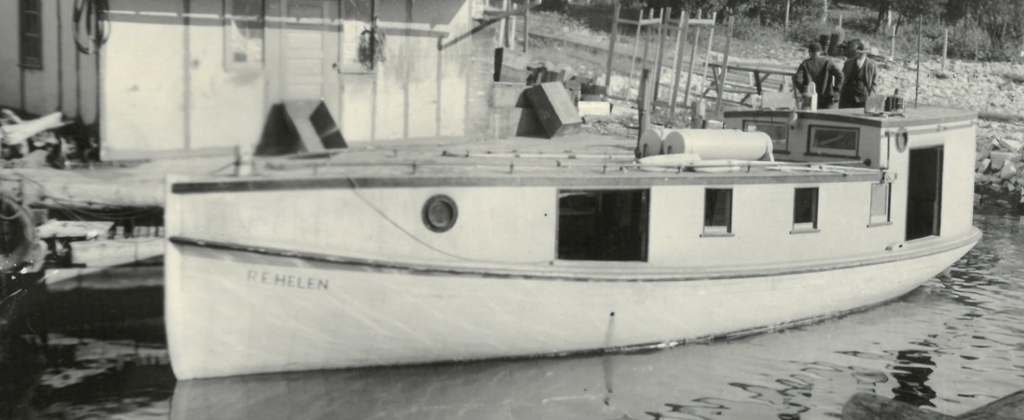 Image of R.E. HELEN sitting in river