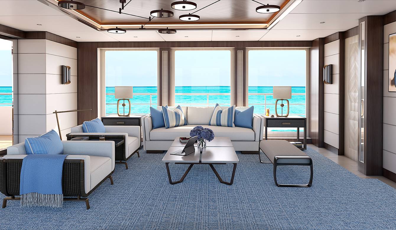 Interior lounging area with large windows in background