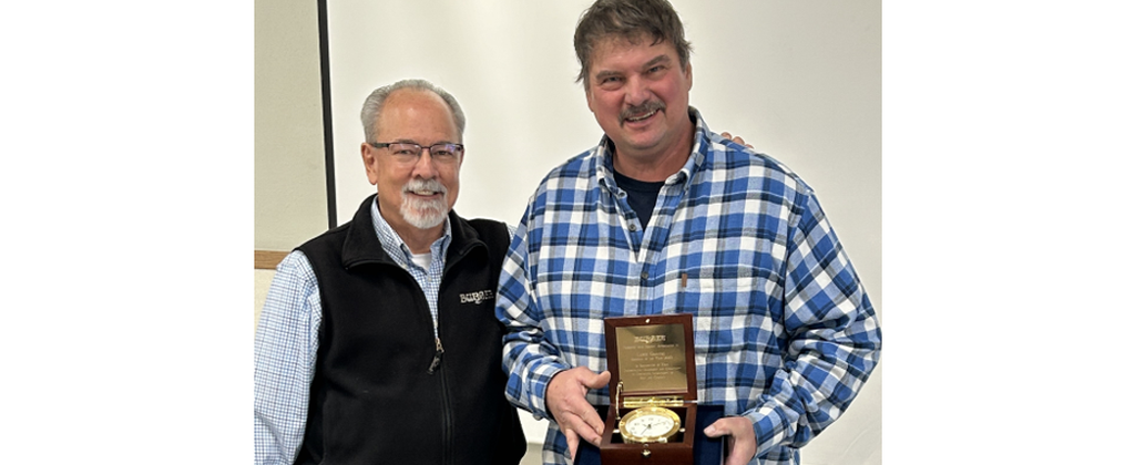 Image of Lance Gaedtke accepting award from Jim Ruffolo