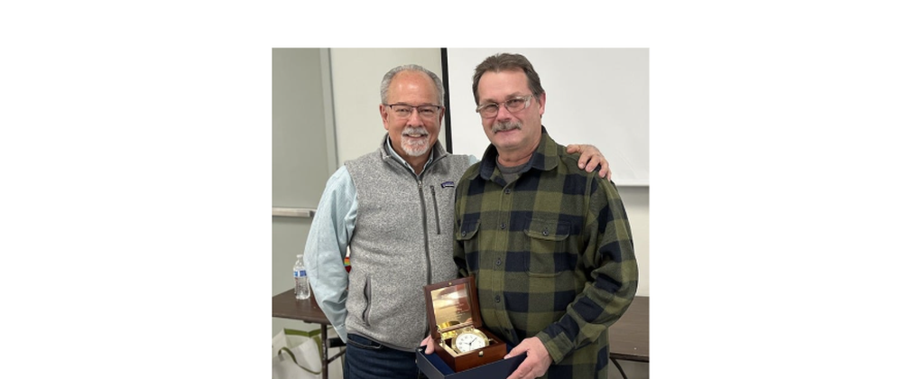 Image of Tony Gadzinski accepting award from Jim Ruffolo