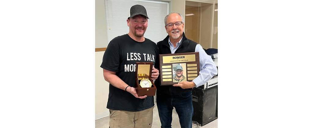 Image of Dave Burton accepting award from Jim Ruffolo